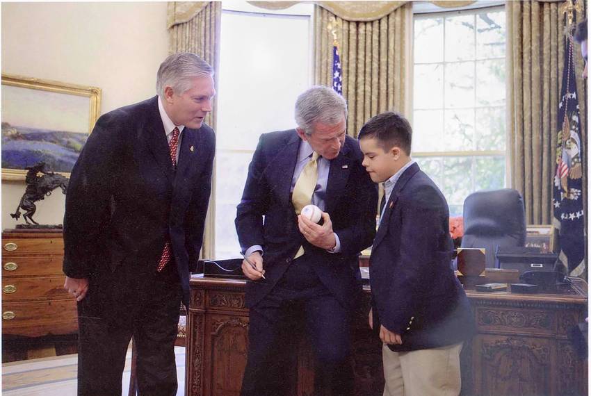 Alex Sessions, right, father of U.S. Rep. Pete Sessions, left, meets President George W. Bush, center, before the passage of Sessions' "Family Opportunity Act" in 2006. Photo courtesy of U.S. Rep. Pete Sessions.