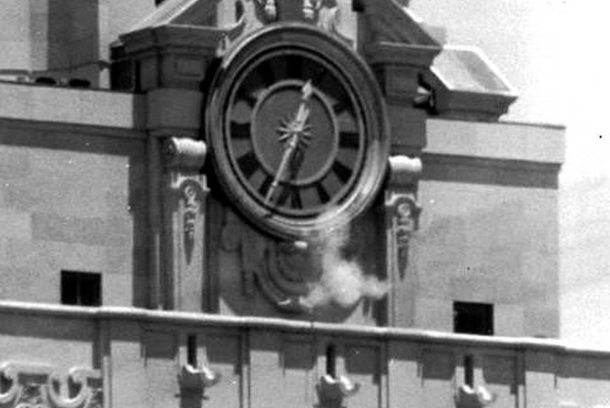 Smoke from the gunman's weapon as he fired from the observation deck of the UT Tower on August 1, 1966.