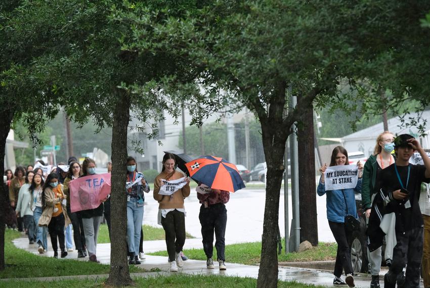 Students of Carnegie Vanguard High School in Houston,TX walk out in the rain in protest to TEA taking over HISD, April 6,2023.