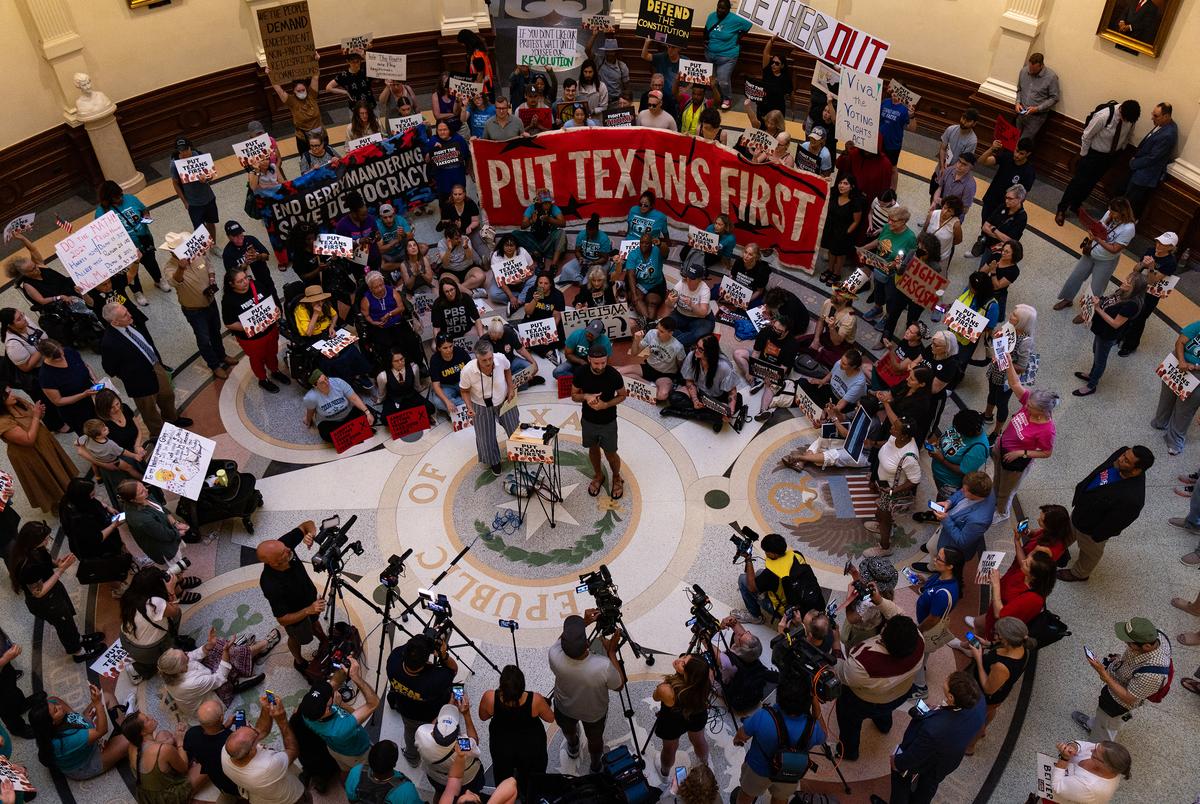 Dozens protest actions in the House to redistrict Congressional maps in the Capitol Rotunda in Austin on August 20, 2025.
