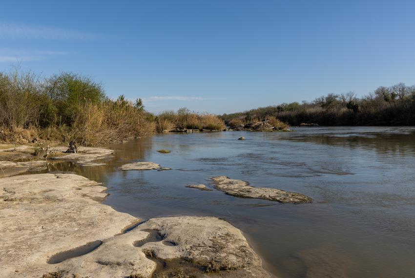 A portion of the Rio Grande River along Joseph Hein’s 580-acre ranch where his horses often drink water on the Webb and Zapata county lines on Feb. 15, 2023. Hein says if the wall is built through his property and restricts access to the river, he will likely have to stop breeding and sell his horses.