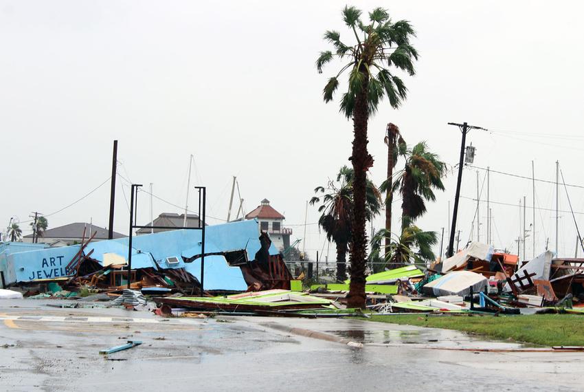 Rain pounds the piles of debris that used to be Sazon Studio & Gallery and Kinky Zebra in Rockport on August 26, 2017, the day after Hurricane Harvey brought devastating damage to the coastal Texas city.