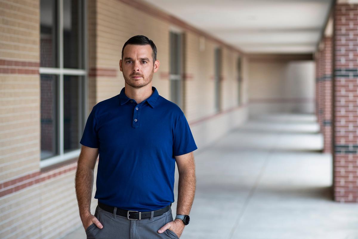 Gordon Mock stands outside of Thompson Elementary School on July 19, 2022, in Houston.