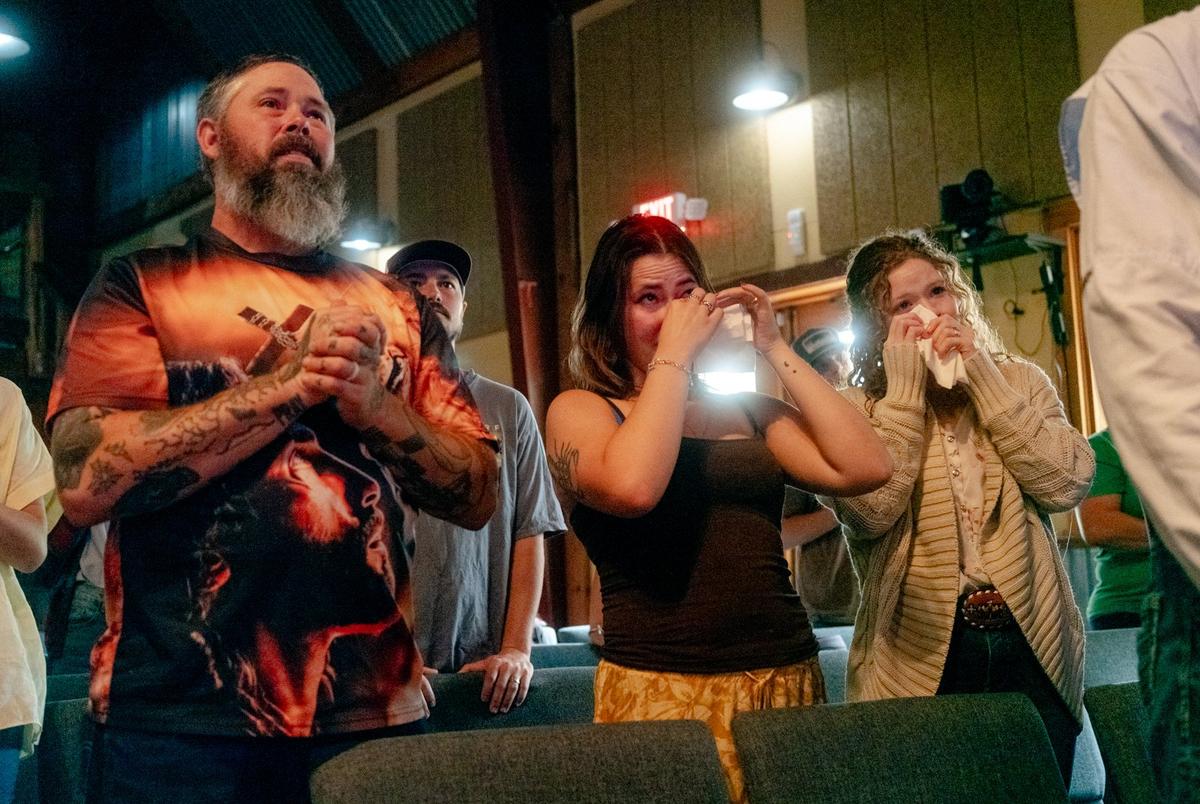 Community members grieve at the Cross Kingdom Church in Kerrville during the first Sunday service after the floods on July 6, 2025.