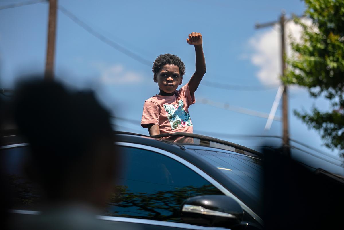 Austin residents celebrated during the annual Juneteenth parade in East Austin on June 19, 2021. Juneteenth commemorates Union Army General Gordon Granger’s proclamation issued on June 19, 1865 in Galveston, which ordered the freedom of more than 250,000 enslaved Black people in Texas who were denied freedom for more than two years after President Abraham Lincoln signed the Emancipation Proclamation. 