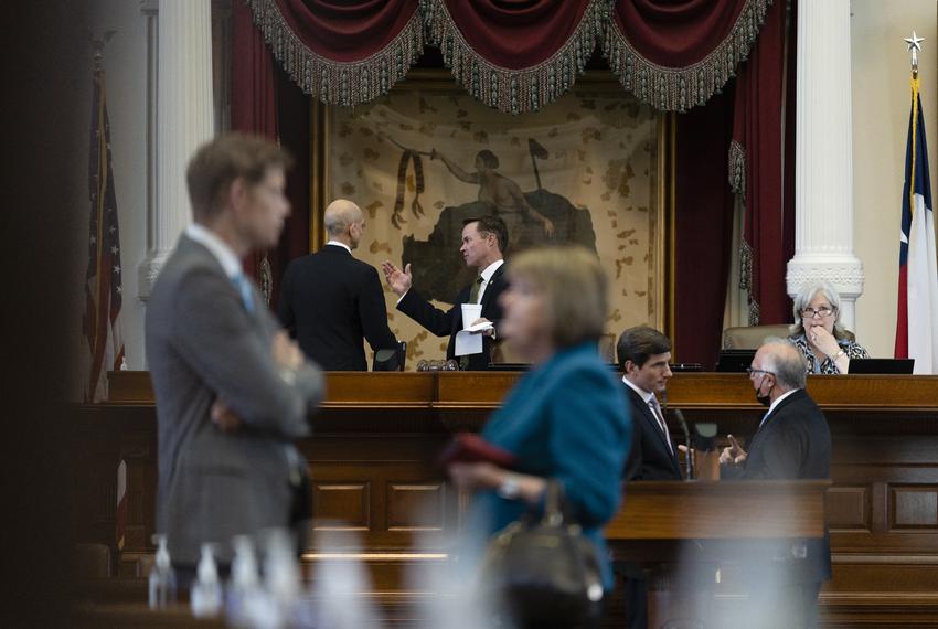 House Speaker Dade Phelan talks to State Rep. Greg Bonnen, R-Friendswood, on the House Floor after ending the first special session on Aug. 6, 2021.