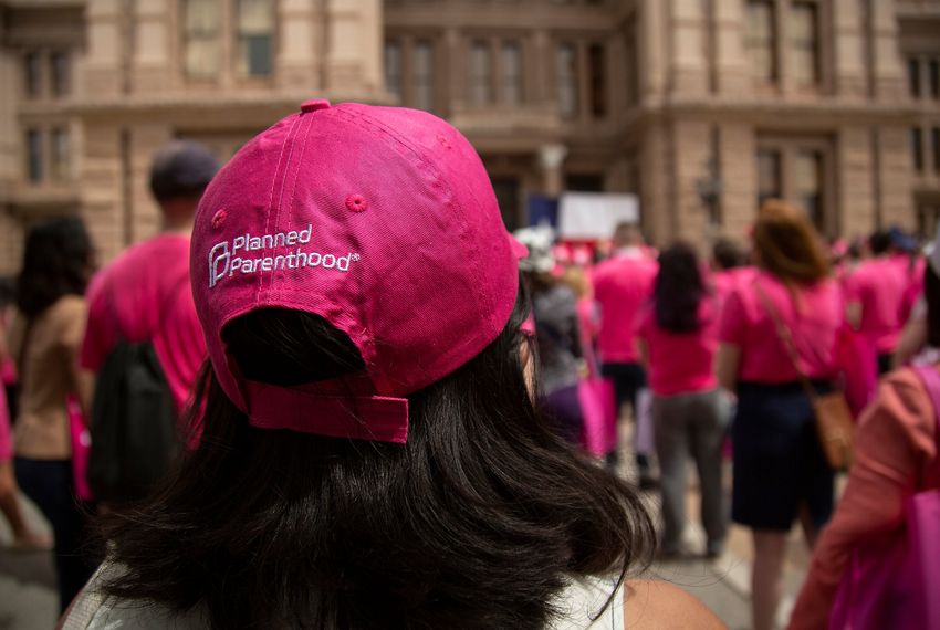 Planned Parenthood advocates rally outside of the Capitol.