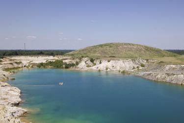 As the mine’s owner and former operator, Luminant, continues its restoration of the site, it is gifting the land to the city of Sulphur Springs, which envisions turning the mound into an amphitheater and the pit into a fishing lake. The alluring color of the water in the pit is due to its high acidity.