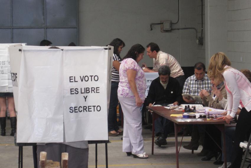 Voters line up to cast ballots in Mexico's presidential election Sunday at a voting sight on Popocatepetl street in Mexico City's Colonia Condesa.