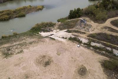 A culvert runs perpendicular to the Rio Grande in Webb County. This strip of land is planned to be assesed by the federal government as a potential site for the Trump adminstrationÃÂ­s border wall expansion. Feb. 12, 2020.