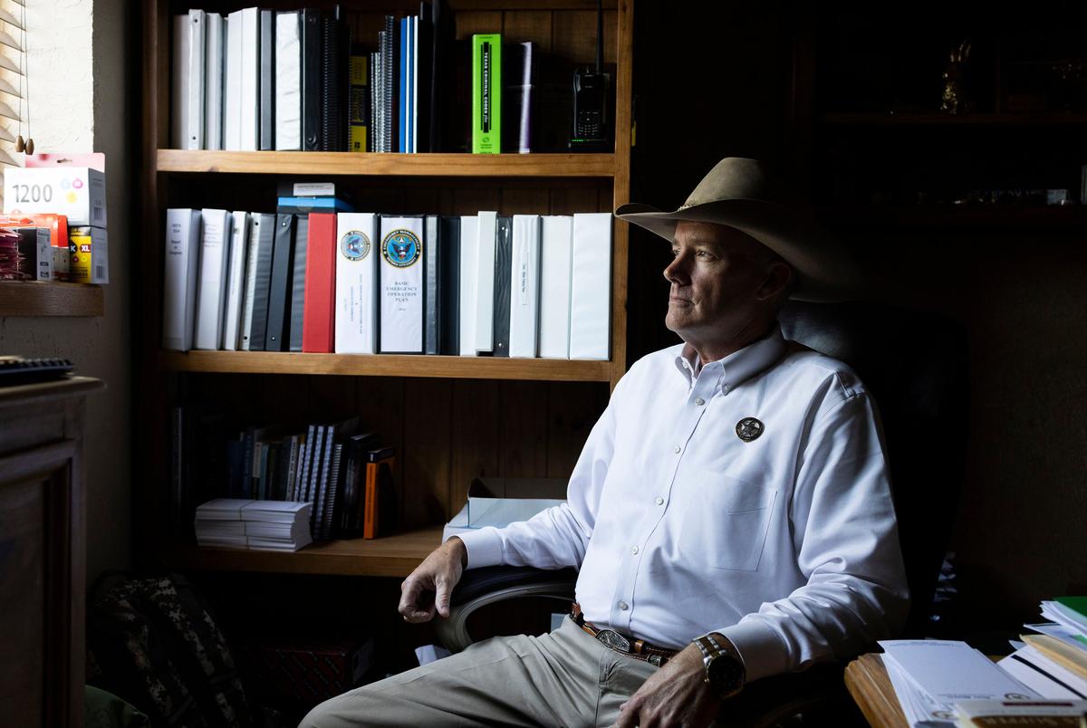 Sheriff Roy Boyd sits for a portrait in his office in Goliad County on May 7, 2025.