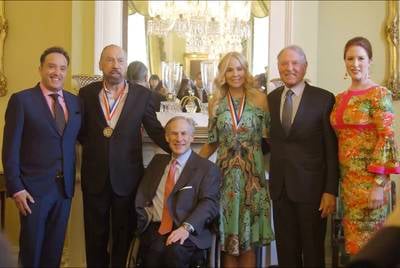 John Paul DeJoria poses with Gov. Greg Abbott in February 2017. He was recognized for his corporate contributions to the arts in Texas.