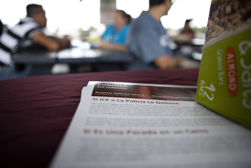 Volunteers with the Workers Defense Project handed out know-your-rights flyers at the River Park Soccer League in Houston on Sunday.