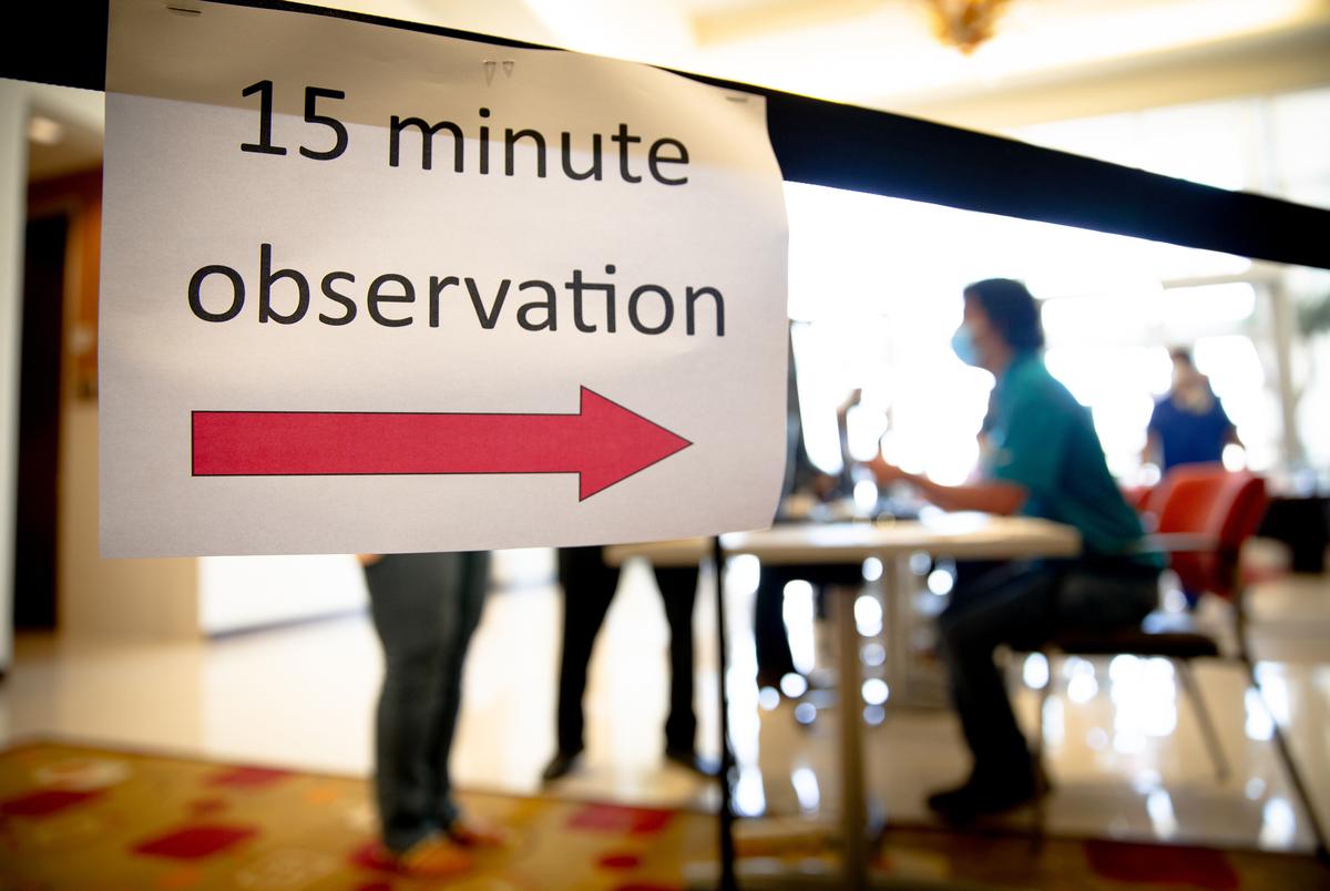 People waited in an observation room for 15 minutes after receiving the COVID-19 vaccine  at DHR Edinburg Conference Center  Dec. 19, 2020.