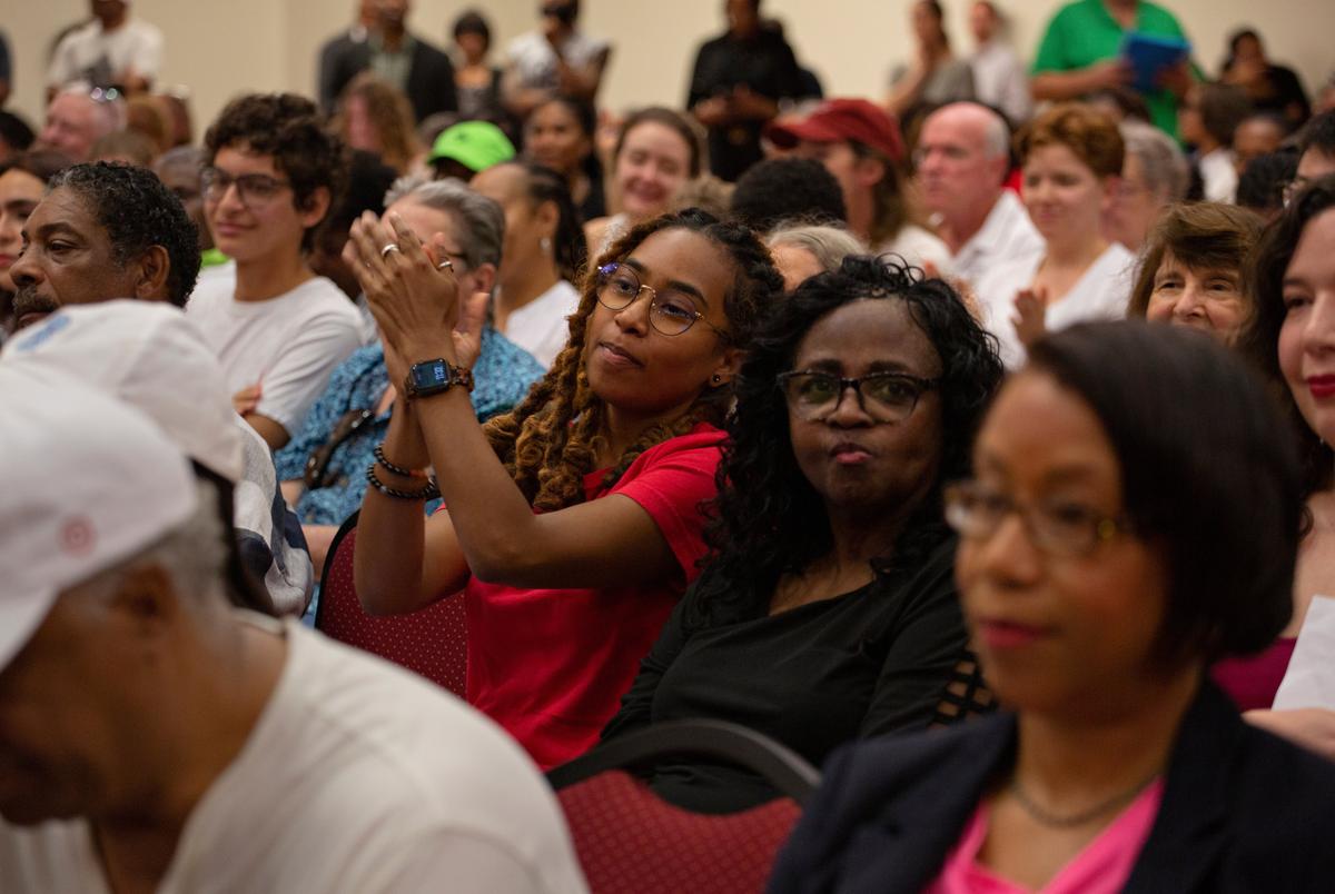People clap during a Congressional Redistricting meeting at the University of Houston campus in Houston, Texas, on July 26, 2025.