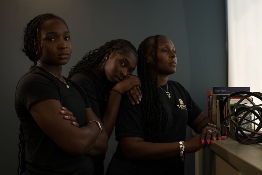 From left, sisters Aniyah, 18, and Erinn, 16, pose for a photo with their mother, Latoya Mayberry on Wednesday, Aug. 6, 2025, in Midland.