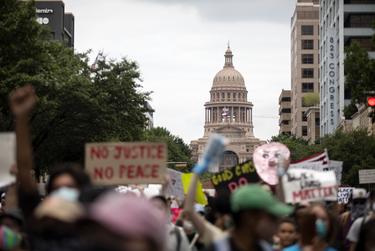 Protesters in Austin marched Sunday against the killing of Michael Ramos in Austin and George Floyd in Minneapolis.