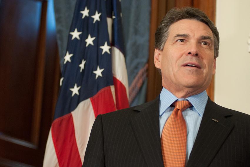 Gov. Rick Perry presenting the Governor's Award for Historic Preservation to the Texas Parks and Wildlife Department Wildland Firefighting Teams.