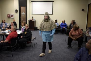 A personal protection equipment training session in Houston on March 12, 2020. Mark Felix for The Texas Tribune | by AFP