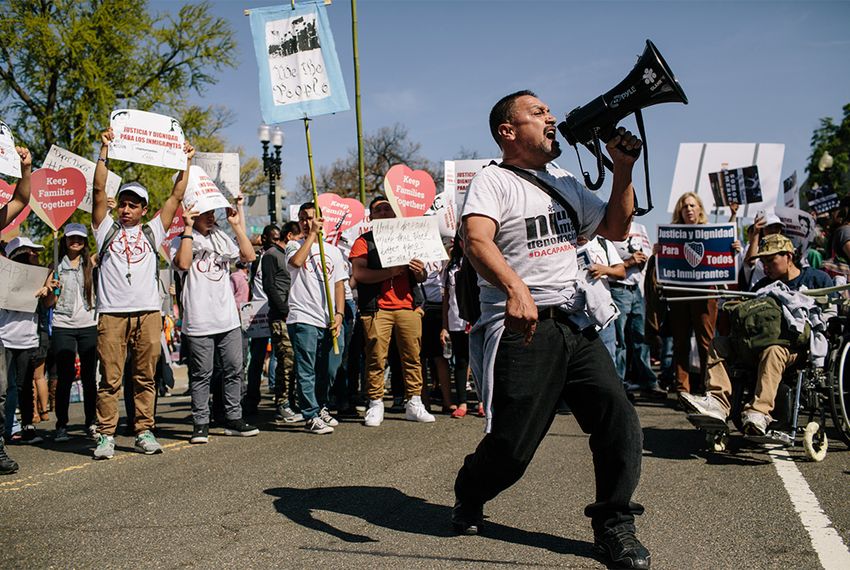 Tomas Martinez, with GLAHR, a grass roots organization from Atlanta, chants to excite the crowd in front of the U.S. Supreme Court in Washington, D.C., on Monday, April 18, 2016.&nbsp;
