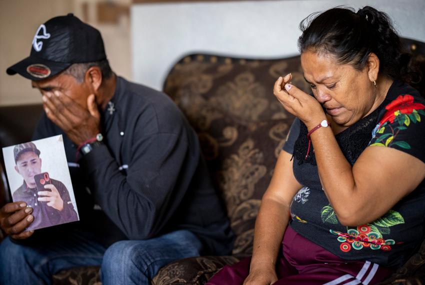Luz Maria Martinez and Napoleon Sepulveda cry over their son, Jesus Ivan Sepulveda, who was shot and killed by a prison warden (at the time) last week near Sierra Blanca, Texas, Wednesday, October 5, 2022, in Juarez, Chihuahua, Mexico. Sepulveda was shot while the group of migrants he crossed the U.S.-Mexico border with stopped for water near Sierra Blanca, Texas. Photo by Ivan Pierre Aguirre for The Texas Tribune