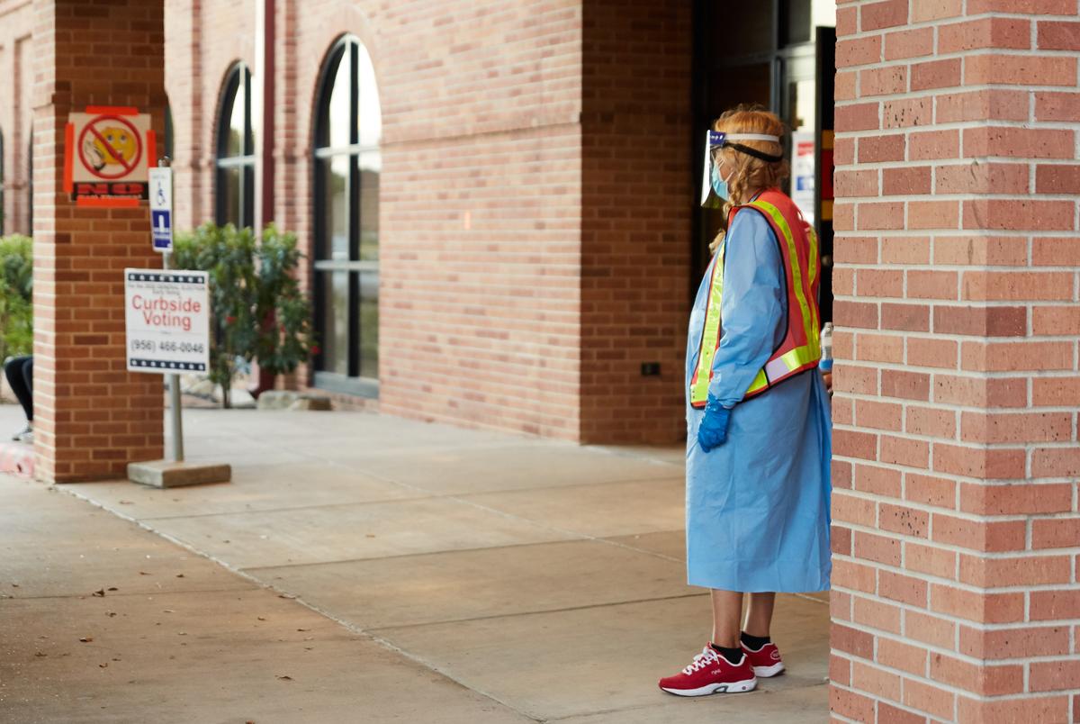 Curbside early voting at Brownsville's Main Branch Library.