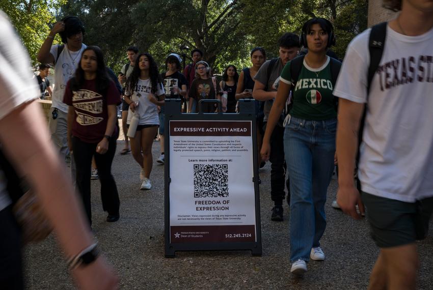 Students walk past a sign denoting an area of free speech at Texas State University on Wednesday, Sept. 17, 2025, in San Marcos.