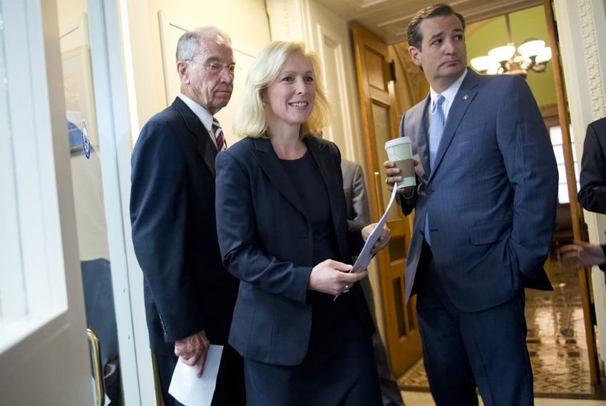 U.S. Sens. Kirsten Gillibrand, D-New York, and Ted Cruz, R-Texas, joined fellow Sen. Charles Grassley (left), R-Iowa, ahead of a July 16, 2015, Capitol news conference on legislation creating a process for reviewing cases of military sexual assault and alleviating victims' fears of reporting an incident.