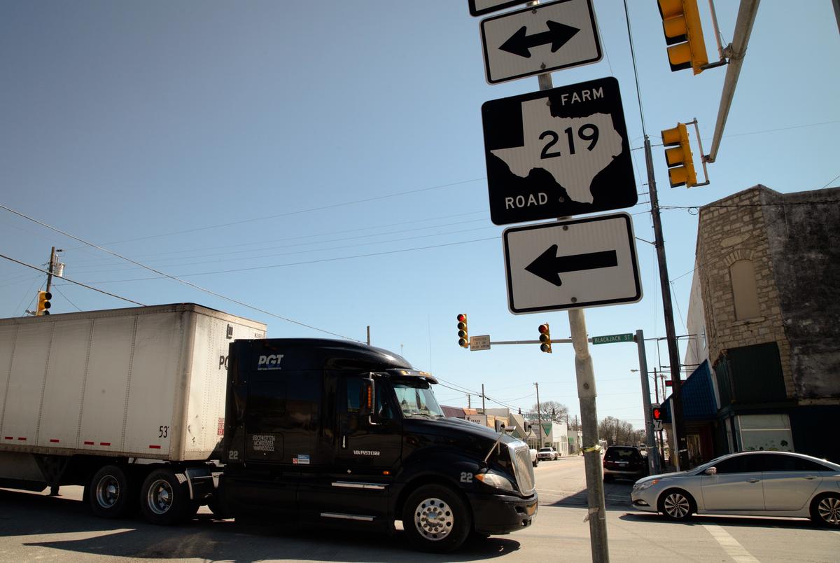 Vehicles pass through Dublin in Central Texas on March 25, 2021.
