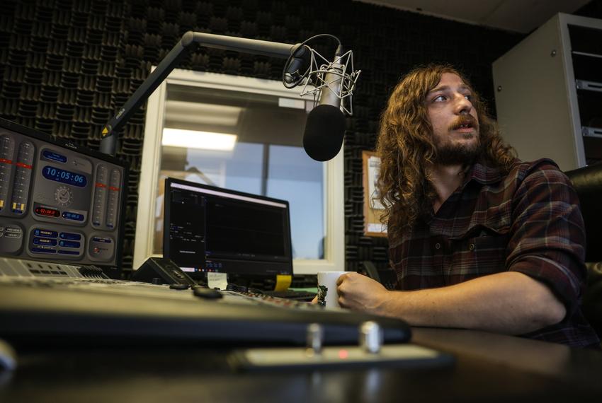Brad Burt reporter for Lubbock NPR or KTTZ sits at his desk in the studio Sept. 2, 2025 in Lubbock, Texas.