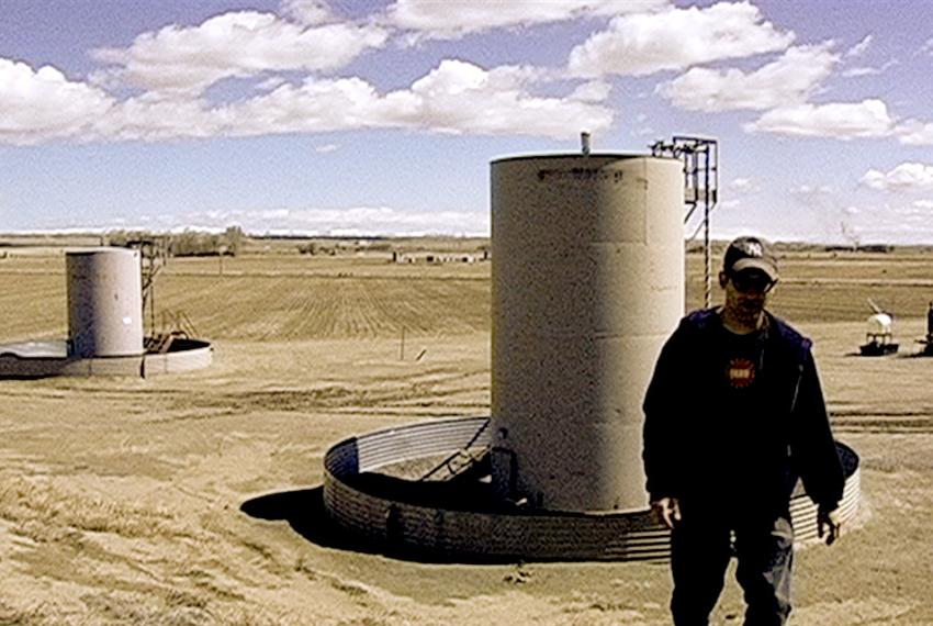 Josh Fox, creator of "Gasland," stands in a Wyoming gas field.