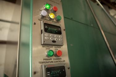 The temperature gauges on an incinerator at a crematorium in Donna read above 2,000 degrees Fahrenheit.