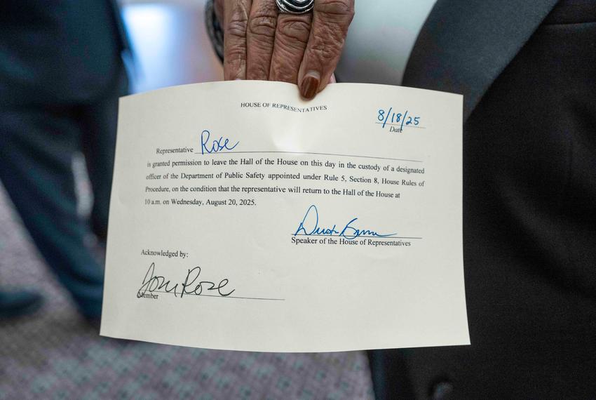 State Rep. Toni Rose, D-Dallas, holds a "permission slip" to leave the chamber as most Texas Democratic members of the House of Representatives return for the second-called special session of the 89th Texas Legislature.  Texas Gov. Greg Abbott threatened absent members with arrest and fines in the first special session that concluded last week.