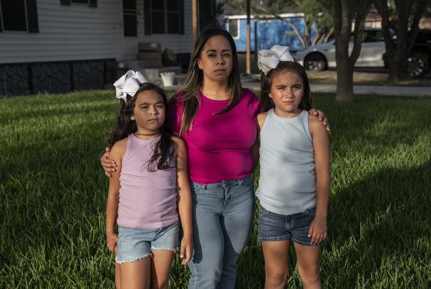 Clarissa Méndez, 44, and her daughters Catiana Ester Méndez, 7, left, and Catalaya Avaneh Méndez, 8, pose for a photo at their home in Hebbronville, Texas on July 30, 2025. Méndez makes a daily one-hour commute to Laredo to work as a nurse. Currently she has her father or another person pick up her daughters from the daycare and take care of them for about an hour until she comes back from work. After picking up her daughters she cooks for them and spends some time with them before she starts working from home for an additional three to four hours. The family does not receive any government assistance and she does not have the support to take care of her daughters while she works. After school programs like ACE allow her to save some money in daycare costs in addition to her daughters learning entrepreneurial skills, get help with homework, etc.
Gabriel V. Cárdenas for The Texas Tribune