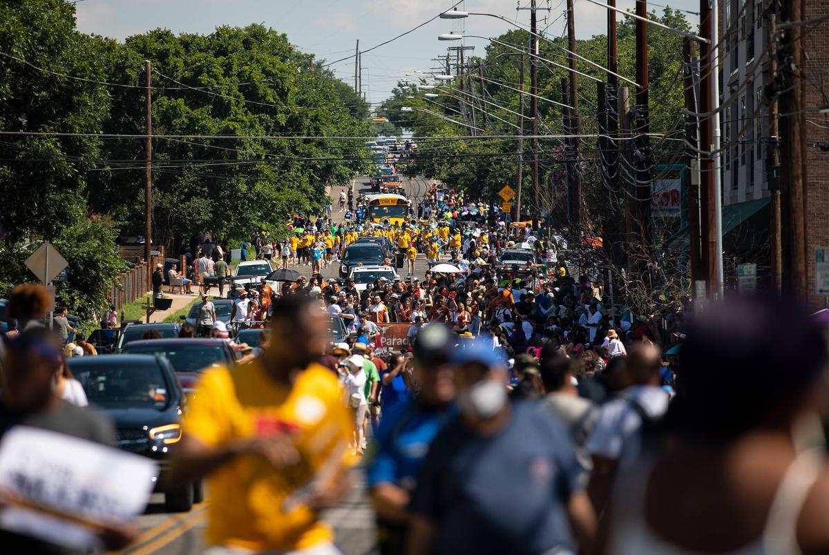 Austin residents celebrated during the annual Juneteenth parade in East Austin on June 19, 2021. Juneteenth commemorates Union Army General Gordon Granger’s proclamation issued on June 19, 1865 in Galveston, which ordered the freedom of more than 250,000 enslaved Black people in Texas who were denied freedom for more than two years after President Abraham Lincoln signed the Emancipation Proclamation. 