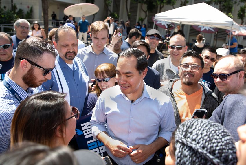 Presidential candidate Julián Castro greets supporters at a rally at James Garfield High School in East Los Angeles on April 6, 2019.