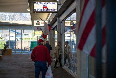 People enter the McLennan County Republican Party headquarters in Waco to hear Frederick Douglass Republicans founder KCarl Smith speak.