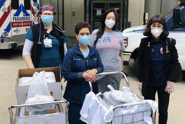 Debbie Chen, second from right, and Stafford City Council member Alice C. Chen, right, deliver meals from local Asian restaurants, including Debbie Chen's, to nurses at Houston Methodist Hospital.