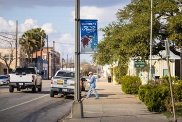 A man walks to his truck after visiting the local post office in Kenedy.