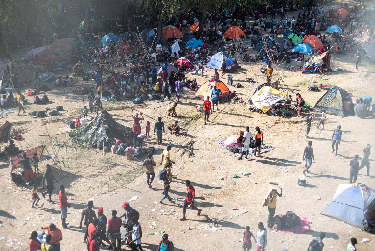 The arrival of immigrants in September 2021 overwhelmed the Border Patrol, which directed people to wait to be processed in an area around the international bridge in Del Rio. With nowhere to sleep, many made their own huts with river cane they’d cut from the banks of the Rio Grande.