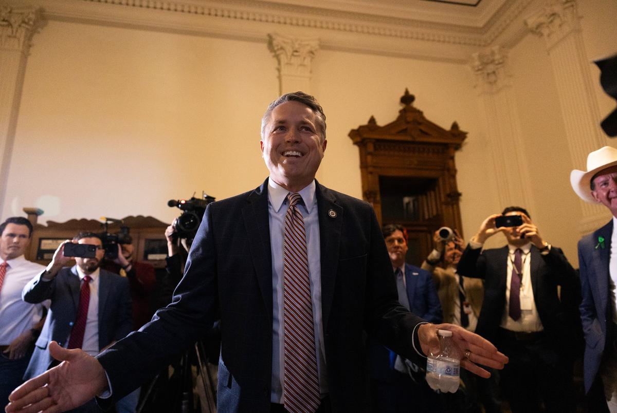 Rep. Brian Harrison, R-Midlothian, speaks to a crowd gathered outside of the Texas House on Aug. 18, 2025. Harrison told the crowd that they were in the wrong city for the action they wanted to happen.
