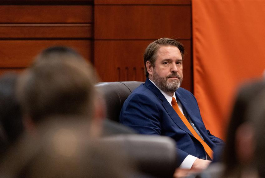 Then-University of Texas Interim President Jim Davis attends an event with Gov. Greg Abbott and Texas Law Federalist Society President Jordan Lamb at The University of Texas Law School in Austin on April 3, 2025.