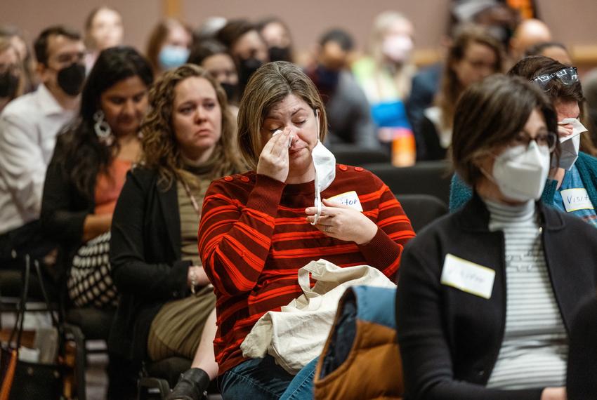 Attendees of at a DFPS Committee meeting in Austin cry while listening to public testimony on gender affirming care for trans youth on Friday Mar. 11, 2022.