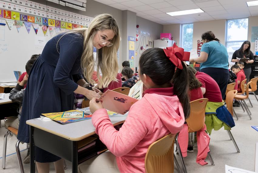 Corina Pannabecker (cq) teaches first grade at Ogden Elementary in San Antonio. Bexar County's school districts are among the most segregated in the state, with boundary lines historically drawn to consolidate resources. San Antonio ISD is working to create more socioeconomic and racial diversity through public school choice measures.