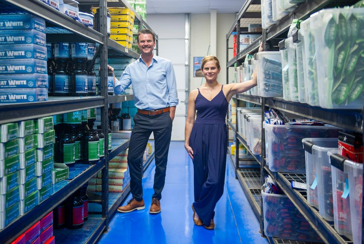 Owners Tiffini and Jeremy Steding pose for a portrait inside the 1836 Kratom warehouse and headquarters Friday, Aug. 8, 2025 in Pflugerville, TX. 1836 Kratom started in 2017 after the couple’s own journey with Kratom.