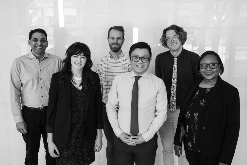 Ayan Mittra, Darla Cameron, Matthew Watkins, Sewell Chan, Bobby Blanchard and Andy Alford pose for a group photo at The Texas Tribune.