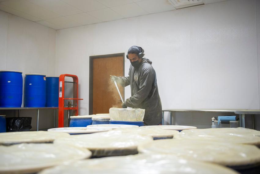 A worker shifts a barrel of Kratom inside the 1836 Kratom warehouse and headquarters Friday, Aug. 8, 2025 in Pflugerville, TX. Kratom is shipped to the United States as a crushed powder and is distributed by 1836 Kratom into various consumption forms.