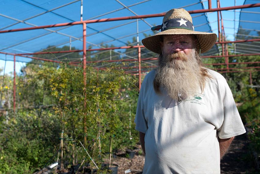 Paul Dowlearn poses for a portrait at Wichita Valley Nursery in Wichita Falls on Oct. 7. Dowlearn has been collecting rain water for years.