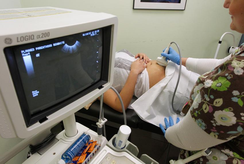 A nurse with a patient at a Planned Parenthood clinic in Austin.