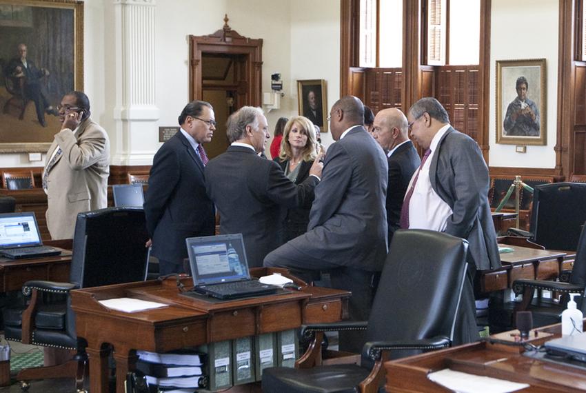 Group of Texas Senate Democrats huddle on Senate floor during break on May 30th, 2011